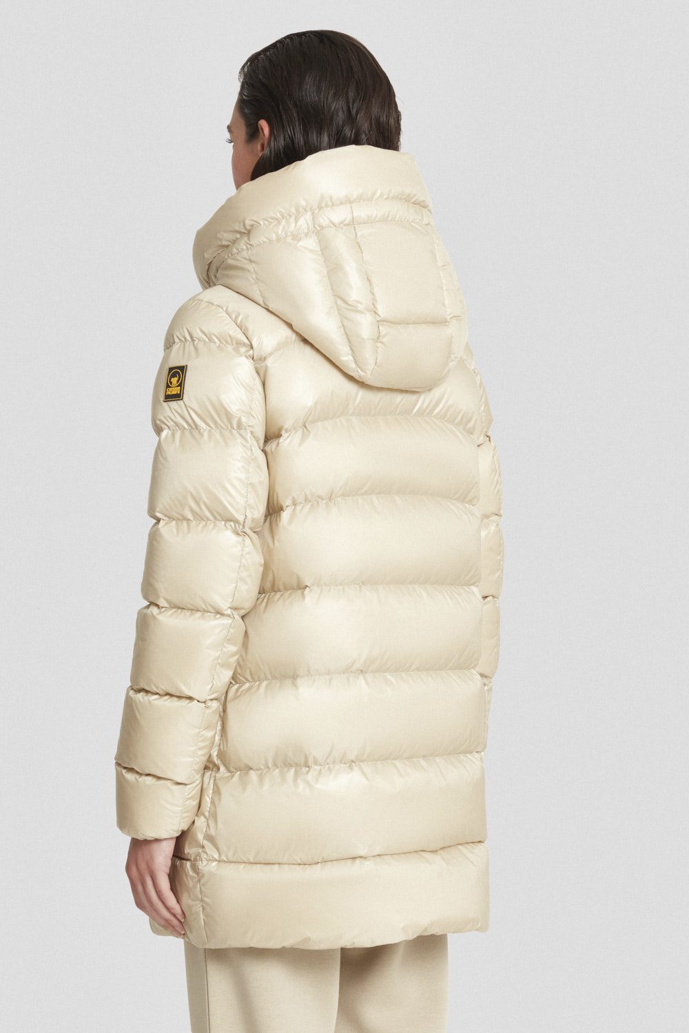 Piumino Ciesse medio-lungo beige con cappuccio staccabile