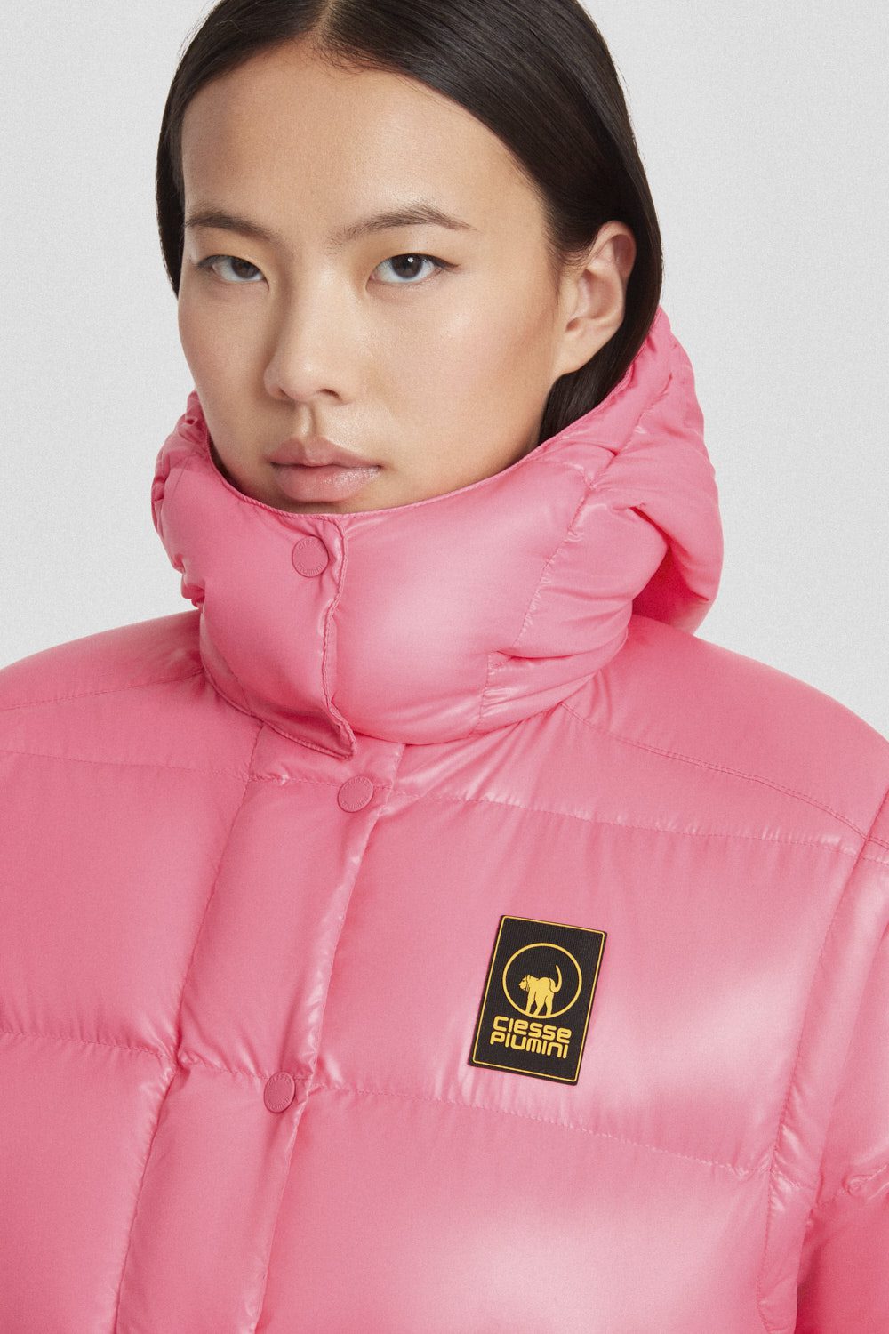 Piumino Ciesse trapuntato fucsia con cappuccio e maniche staccabili