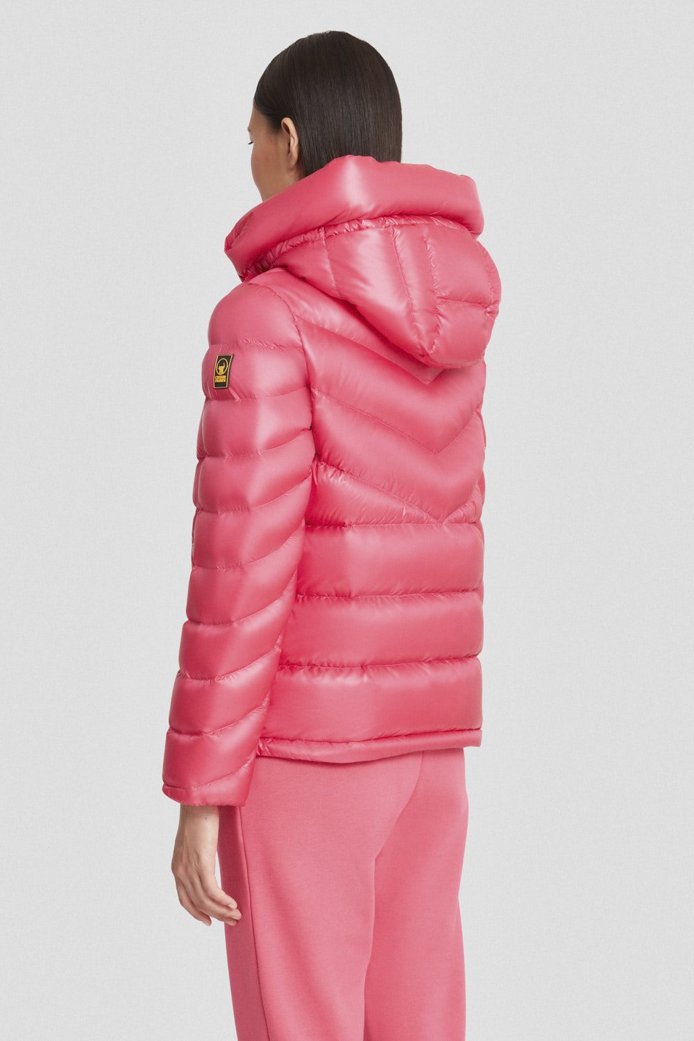 Piumino Ciesse corto fucsia con cappuccio staccabile